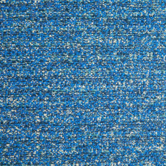 Borzalino fabric sample, blue woven textile, granular texture with turquoise, white, and gray fibers; directional weave, matte finish.