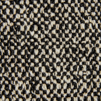Houndstooth wool blend fabric with black and off-white interlocking geometric pattern, featuring a twill weave and visible texture.