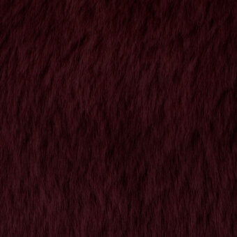 Burgundy fabric texture sample, short-pile velvet or faux fur, dense bristled surface with tonal variations and a matted finish.