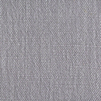 Fabric texture sample, muted gray, densely packed rounded granules, consistent surface with subtle tonal variations, even studio lighting.