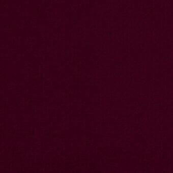 Burgundy velvet fabric, dense pile texture, uniform nap, rich saturated color, Borzalino Augusta Velvet fabric (l) collection.