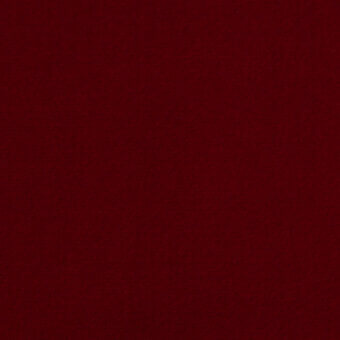 Burgundy velvet fabric with a woven texture and matte finish, displaying subtle tonal variations; textile labeled “augusta velvet – 20”.