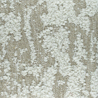 Beige textile sample with irregular cream nubbins, exhibiting a dense, tactile woven texture and neutral color palette with diffused lighting.