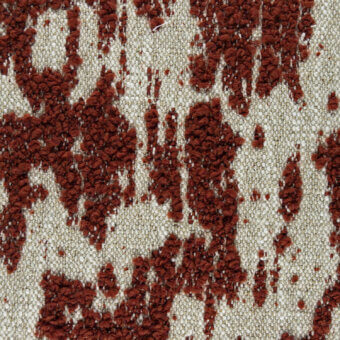 Woven fabric texture with rust-colored tufts on cream, irregular pattern, subtle grid background, natural fiber appearance, bibbona g306 sample.