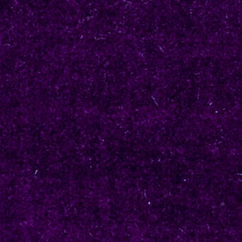 Deep purple boss velvet fabric texture with a uniform, raised nubby pile and diffused lighting highlighting rich color variation.