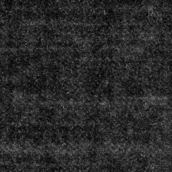 Dark gray velvet fabric sample displaying a dense, granular texture with short fibers and subtle raised tufts in a matte finish.