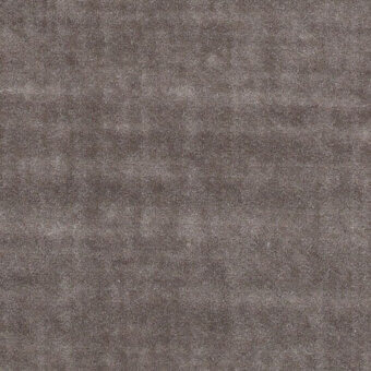 Velvet fabric sample, gray-brown tone, uniform matte texture with subtle mottling and a dense pile, displaying a slightly distressed appearance.