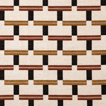 Geometric fabric pattern with cream, black, brown, and gold rectangular blocks; textured weave suitable for upholstery, labeled “aplomb 71406 – 002”.