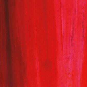 Red velvet fabric with vertical folds displays a dense pile and soft sheen, identified as Lagune Velvet 71253 Carmen 008 textile.