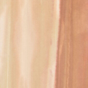 Velvet fabric sample, dune color, with a soft pile and subtle vertical striations displaying a muted, sandy beige tone and gentle gradient.