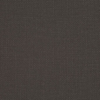 Charcoal gray looped pile fabric sample with a matte finish and dense, granular texture; product code “loop k5042 – 29” visible.