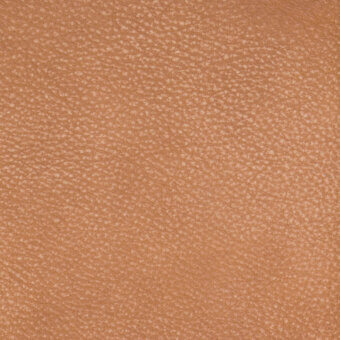 Tan brown leather texture with dense granular pattern, matte finish, and subtle grain variations displaying a uniform, slightly rough quality.