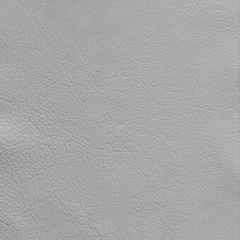 Light gray leather texture with a pebbled grain, matte finish, and subtle wrinkles against a white backdrop, displaying a cool neutral tone.