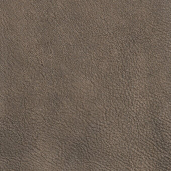 Distressed leather texture sample in muted rust color, displaying fine wrinkles, creases, and pores with a matte finish.