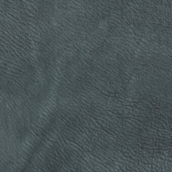 Grayish-green rustico leather texture with irregular grain, matte finish, and subtle tonal variations; natural, minimally processed surface.