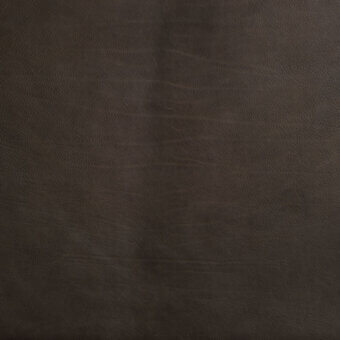 Dark brown vegetable-tanned leather texture sample, “borzalino l11 waterfall,” displays a matte finish with a pronounced, irregular grain pattern.