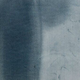 Gradient texture displaying teal to pale gray, with a vertical faded band and granular surface, resembling weathered leather or textile.