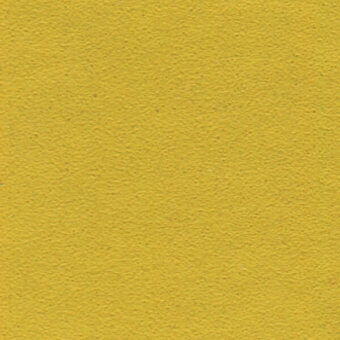 Mustard yellow fabric sample with granular matte texture, displaying tonal variations and printed text “bross > fabric (a) extrema ikon > col. 1030”.