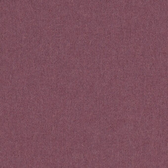 Dusty rose fabric texture with a matte finish, exhibiting a granular woven construction and subtle tonal variations, labeled “bross fabric col. 65032”.