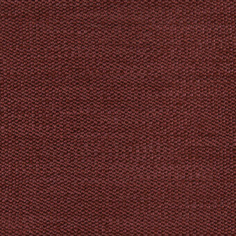 Reddish-brown woven fabric sample with a dense, uniform texture featuring small raised circular patterns and a matte finish.