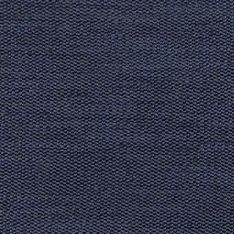 Navy blue fabric sample with a raised dot pattern, labeled “bross fabric (b) nice col. 605,” displaying a matte, textured weave in a studio setting.