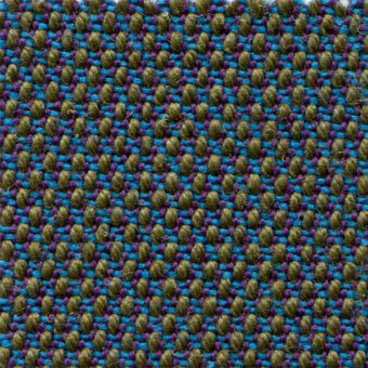 Woven fabric texture, teal, olive, purple blend, irregular looped pattern; “bross steelcut trio col. 883” text visible, matte finish.