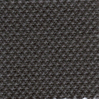 Dark gray woven fabric texture, “steelcut” design, features dense circular nubby pattern and consistent tight weave.
