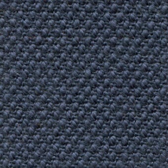 Dark charcoal gray nubby fabric texture with tight weave, brushed finish, and visible yarn loops; labeled “steelcut col. 780”.
