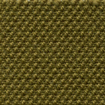 Olive-green bross fabric texture displays a dense, nubby weave with tonal variations and a matte finish; sample labeled “col. 985”.