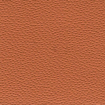 Terracotta textured surface with repeating perforations, matte finish, and uniform color, resembling a dense, dimpled textile or synthetic material.