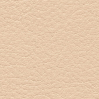 Light beige leather texture with a granular, pebbled surface and subtle mottling, displaying a natural grain and matte finish.