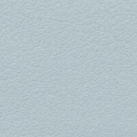 Granular pale blue-gray texture with a subtly mottled, uneven surface and diffuse lighting, displaying a consistent, non-repeating visual composition.
