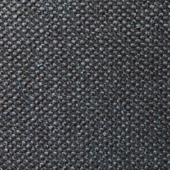 Dark gray woven fabric texture with repeating raised circular nodes, matte finish, grid-like weave, identified as Marluck by Casa Casati.