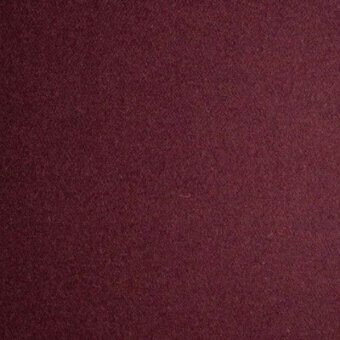 Red casa casati fabric texture, il panno 1267, displays a matte finish and granular weave with tonal variations for depth.