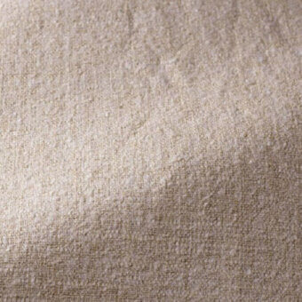 Beige linen fabric texture with a granular weave, displaying subtle tonal variations and a matte finish; text reads “casa casati > fabric (d) > arsene > arsene 002”.