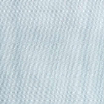 Pale green fabric sample with a linear woven texture, displaying raised ridges and recessed valleys; “casa casati” branding visible.