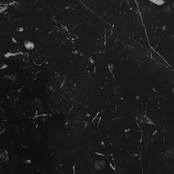 Nero marquinia marble texture displaying black surface with dense white veining, irregular inclusions, and a polished glossy finish.