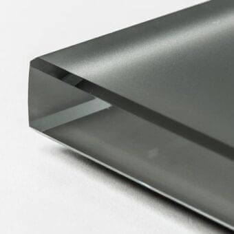 Frosted glass panel, graphite gray, rectangular shape with clean edges; Cattelan Italia collection, minimalist design, diffused light.