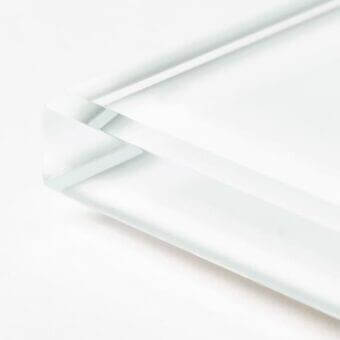 Frosted glass panel with white painted edge, geometric form, 90-degree angle, translucent surface, studio lighting, minimalist design.