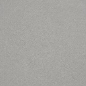 Dove gray leather texture with a matte finish and subtle grain, displaying a smooth, uniform close-weave construction under diffused lighting.