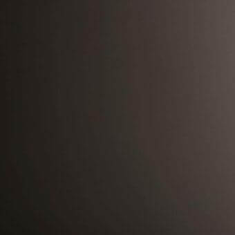 Gray gradient background transitioning from dark to light, displaying a smooth, uniform tone with diffused lighting and minimalist composition.