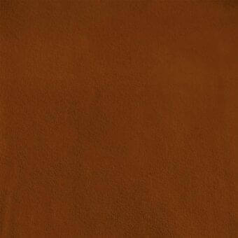 Sunstone micro nubuk texture with granular surface, displaying a consistent warm earthy tone and subtle diffused light gradient.