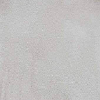 Matte off-white texture, granular surface coating with consistent roughness, even diffused lighting, no discernible pattern or directional grain.