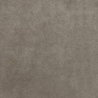 Muted gray nubuk texture sample with a dense, short nap and matte finish, displaying subtle tonal variations and a soft, diffused appearance.