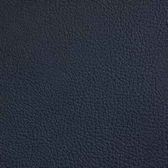 Cattelan Italia Soft Leather texture, navy blue 940 finish, displaying a dense pebbled grain and matte, slightly distressed surface.