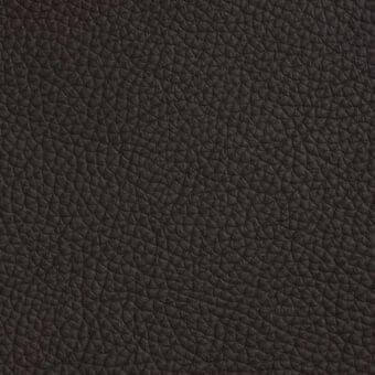 Dark brown quilted leather texture with a repeating bump pattern, matte finish, and natural grain; Cattelan Italia 943 moka 1584.