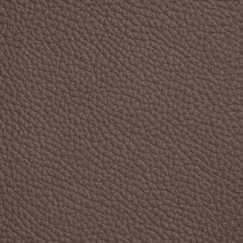 Cattelan Italia Soft Leather 946, marrone 1585: close-up of textured, full-grain leather with repeating bumps and a subtle matte sheen.