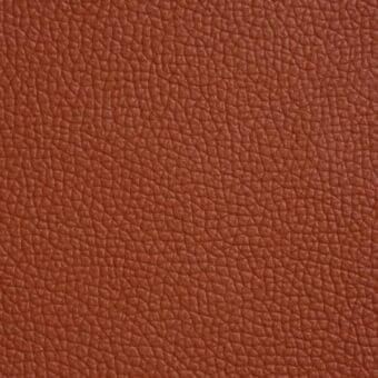 Cattelan Italia soft leather sample, canyon 994 color, displaying a dense pebbled grain and warm terracotta tone with a smooth finish.