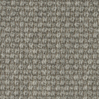 Corno fabric sample, gray-beige woven texture, dense grid pattern with matte finish and subtle heathered tonal variations from cierre1972.