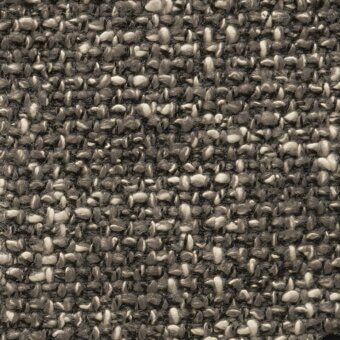 Charcoal gray and off-white wool blend fabric sample with a dense, speckled weave and nubby texture; “funky 90” pattern visible.